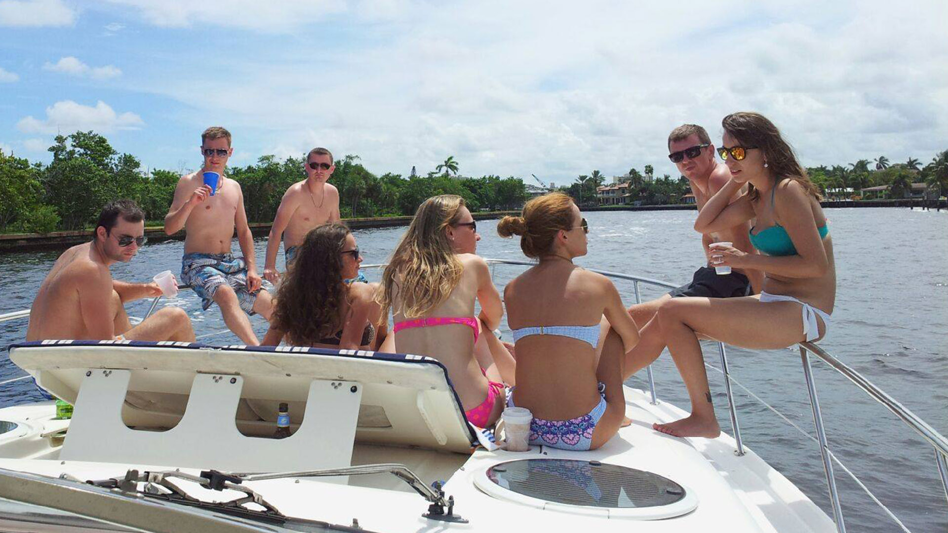 Young Adults on a Yacht Having Fun